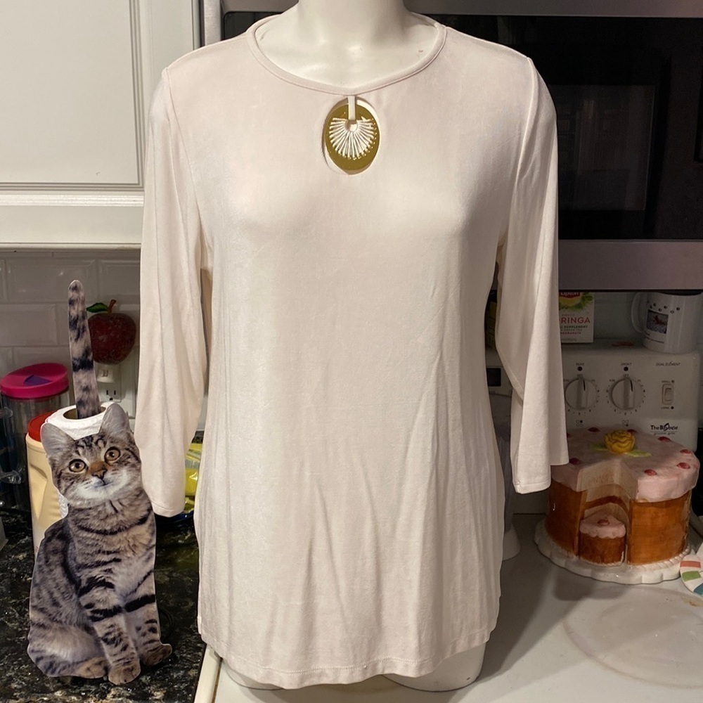 A womens Travelers by Chico’s solid white lined stretch regular size top size 2